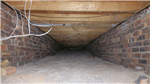 Underfloor insulation from outside your home. Before picture. Call us for advice on access. Gallery Thumbnail