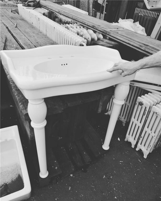 One of the only items we sometimes buy in modern.  Sanitary ware can be difficult to salvage in great condition. 
This is a modern but really lovely decorative sink with decorative legs. Gallery Image