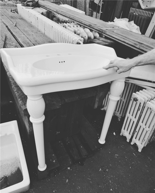 One of the only items we sometimes buy in modern.  Sanitary ware can be difficult to salvage in great condition. 
This is a modern but really lovely decorative sink with decorative legs. Gallery Image