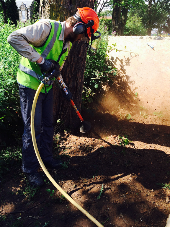 Using the Air Spade for de-compaction. Gallery Image