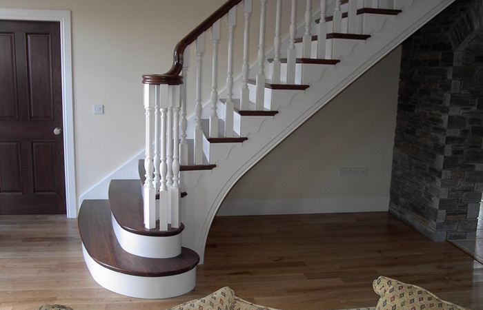Walnut & white cut string and bracket staircase. Gallery Image