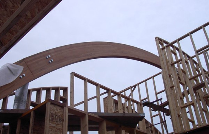 American white oak laminated curved beams. Gallery Image
