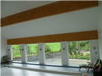 Large glulam beams, supporting roof structure of private swimming pool outside Ballycastle. Gallery Thumbnail