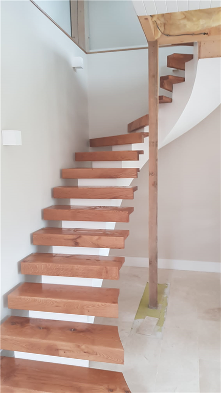 Curved staircase in situ fabricated off site and installed with glass balustrading Gallery Image