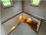 Curved staircase with recessed lighting Gallery Thumbnail