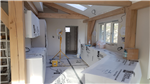 Oak frame new build with kitchen and curved staircase Gallery Thumbnail