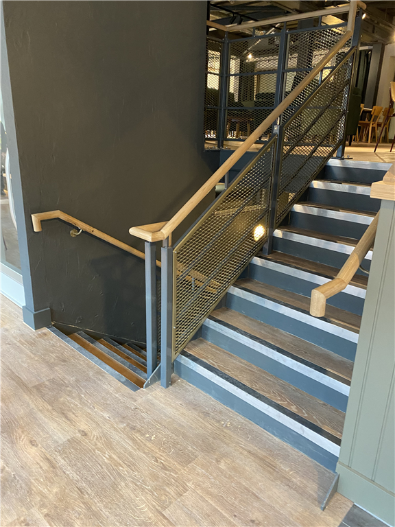 Bespoke steel staicase with balustrade and timber top handrail Gallery Image