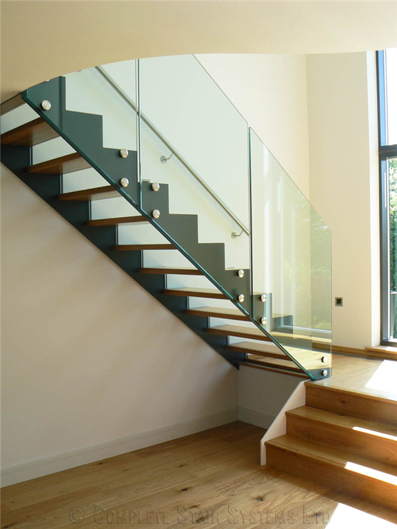 Bespoke 1/2 turn, Oak Treads and framless glass balustrade  Gallery Image