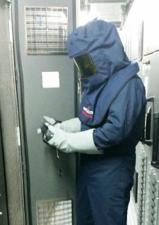 Safety First - One of Geo Therm Ltd' NDT Thermal Imaging & Ultrasound Surveyors Kitted Out In PPE. Gallery Image